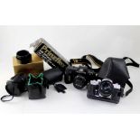 A quantity of photographic equipment to include a Nikon F-401 35mm camera,