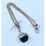 A 9ct yellow gold double Albert chain with smoky quartz swivel fob, length approx 44cm,