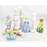 Four Royal Worcester figures comprising 'Friday's Child Is Loving and Giving',