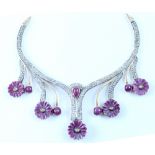 An Art Deco style diamond and ruby necklace,
