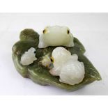 Two green onyx decorative ornaments,