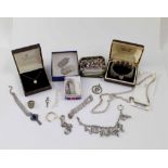 A large mixed group of silver jewellery including charm bracelets, bracelets, pendants, necklaces,