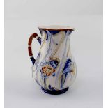A late 19th century Moorcroft for MacIntyre Florian Ware jug, registered design 308392,