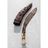 A Nepalese kukri with yellow metal inlay on blade and horn grip,