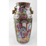 A 19th century Chinese Canton Famille Rose twin-handled vase with folded rim,