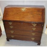A George III mahogany bureau with fitted interior over four long drawers, on bracket feet,