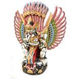 A South Indian or Sri Lankan (Ceylonese) winged spirit or demon figure, polychrome painted wood with