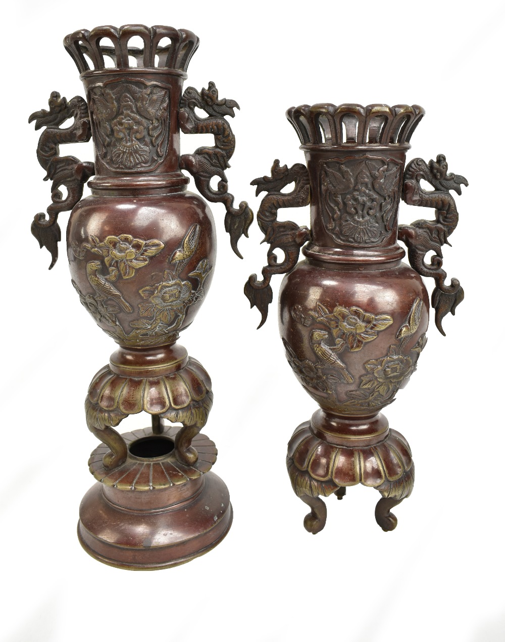 A pair of late 19th/early 20th century Japanese patinated bronze vases with cast twin dragon