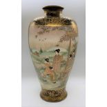 A very large Japanese Meiji period Satsuma vase, the twin panels both decorated with figures in a