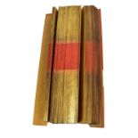 A 19th century Burmese palm leaf prayer manuscript with gilt and red edges and red lacquered outer