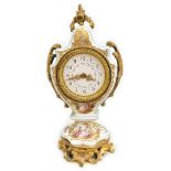 An early 20th century French porcelain hand painted clock, with gilt metal mount surrounding hand