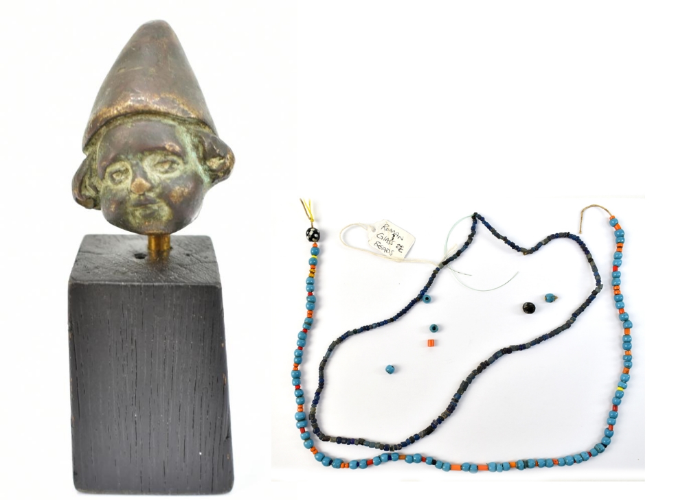 Two Roman glass bead necklaces, circa 2nd century AD, and a small bronze figural bust wearing cone