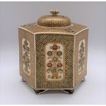 A fine Japanese Meiji period Satsuma hexagonal koro and cover, the pierced domed lid above mon