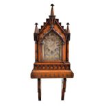 DOBSON OF HIGHSTREET MAIDSTONE; a Victorian oak Gothic bracket clock, the case with carved detail,