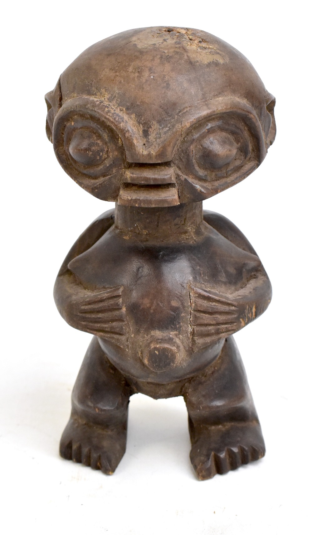 A Camaroon pygmy figure, height 17cm.