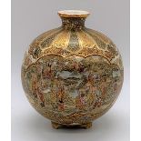 A good Japanese Meiji period Satsuma globular vase decorated with two main panels set with figures