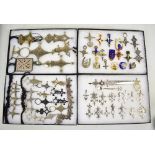 A quantity of white metal and other African tribal jewellery including rings, enameled brooches
