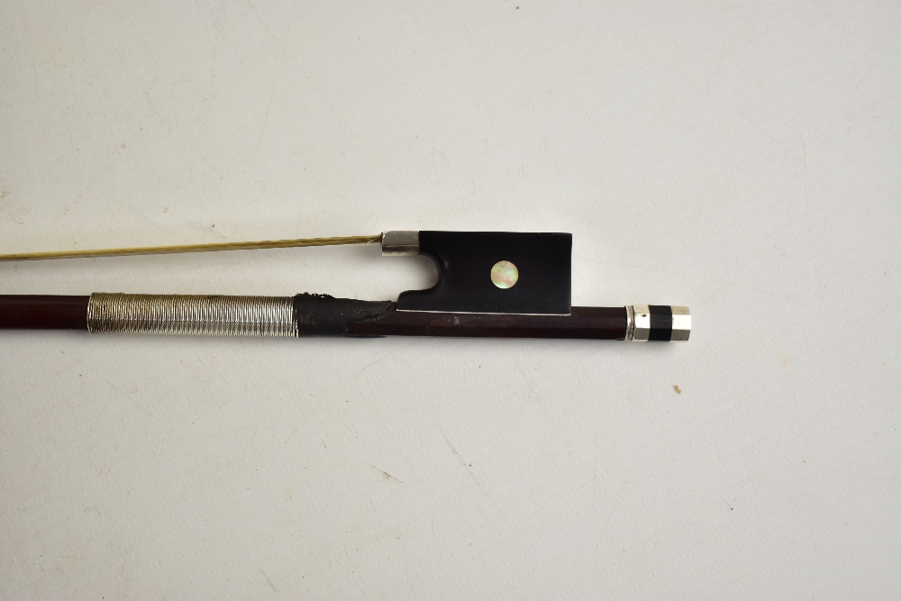 A silver mounted violin bow stamped 'Chanot', overall length 74.3cm. Additional InformationGeneral - Image 4 of 16