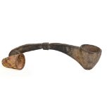 A Turkana ladle, length 43cm, and a stitched animal conical sheath, length 9.5cm (2).