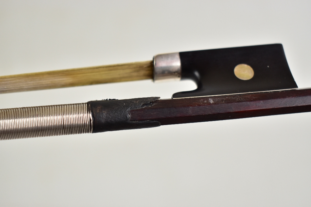 A silver mounted violin bow stamped 'Chanot', overall length 74.3cm. Additional InformationGeneral - Image 12 of 16