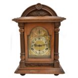 A late 19th/early 20th century mahogany cased bracket clock, the gilded face with chime and silent