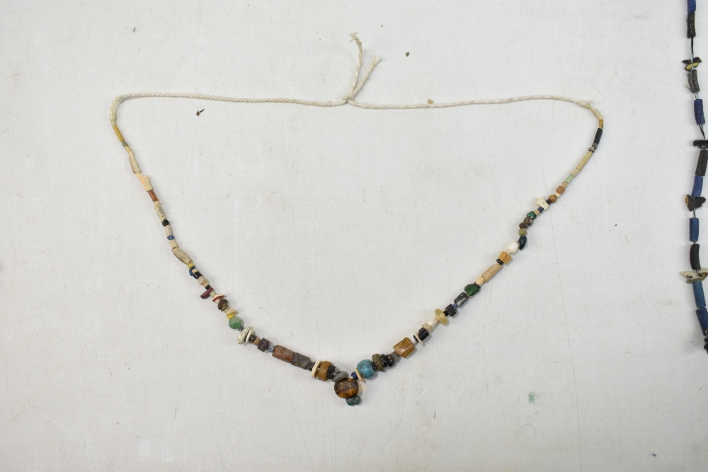 A small group of ancient jewellery including Egyptian faience turquoise glazed beads, Javan orange - Image 11 of 18