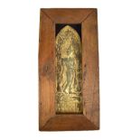 An ancient Southeast Asian arched plaque depicting a Bodhisattva, 33 x 10cm, now in wooden frame.