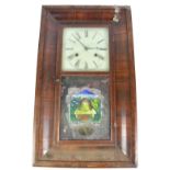 BREWSTER & CO OF BRISTOL, CONN. USA; a late 19th century American mahogany veneered ogee wall clock,