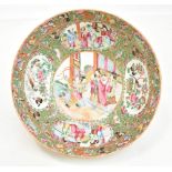 An early 20th century Chinese Canton porcelain bowl of circular form painted with panels featuring