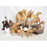 A quantity of camel related items including a large Steiff camel, a reproduction Bergmann figure,