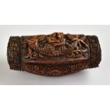 A 19th century carved coquilla nut snuff box, the hinged lid featuring male and female figures
