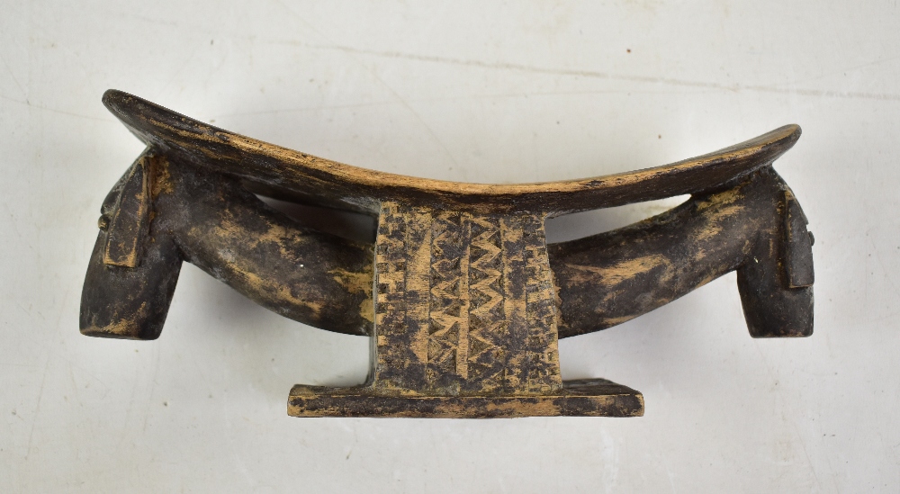 A collection of African tribal white metal carvings including a wooden neck rest, bowls, etc. - Image 2 of 8