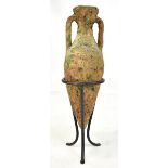 A 4th-1st century BC Cretan amphora, height 32cm, now presented in a metal frame.Additional