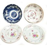 Two 18th century Chinese porcelain Famille Rose plates, each painted in enamels with floral