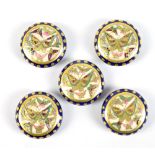 A set of five early 20th century Japanese Satsuma buttons decorated with butterflies.