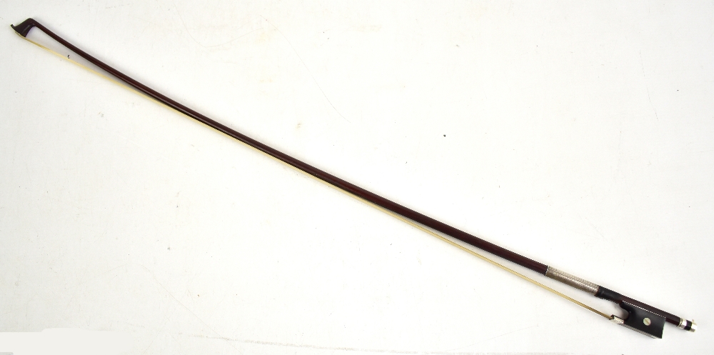 A silver mounted violin bow stamped 'Chanot', overall length 74.3cm. Additional InformationGeneral