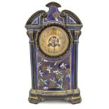 GIEN; a late 19th century ceramic mantel clock decorated with gilt floral panels and scrolls with