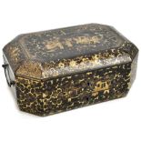 A 19th century Chinese lacquered workbox of shaped rectangular form, with gilt decoration