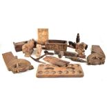A quantity of carved wooden African tribal items, the majority zoomorphic related, also a box and