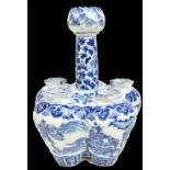 A 19th century Chinese porcelain six division tulip vase painted in underglaze blue with martial