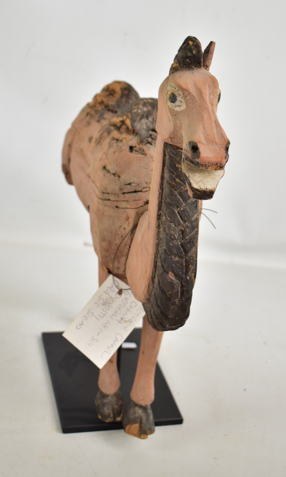 A Chinese carved wooden figure of a camel, northern Wei-Sui, some parts 300-500 AD with some more - Image 3 of 5