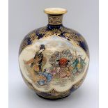 KINKOZAN; a fine Japanese Meiji period Satsuma vase decorated with twin panels, the first with