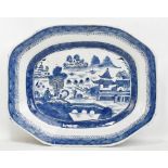 An early 19th century Chinese blue and white export octagonal meat plate, centrally decorated with a