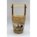 A Japanese Meiji period Satsuma pail with millefiori upper section and base decorated with two