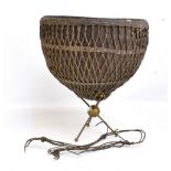 A North West Indian ladakh drum with metal body, velum skin and knotted sinew binding on a brass
