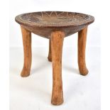 A Kenyan circular stool with bead work decoration dated 12.11.31.