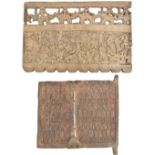 A Dogon carved wooden granary door decorated with three rows of figures, height 45cm, width 46cm and
