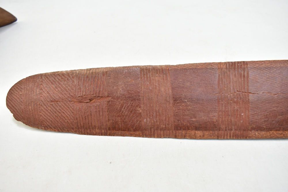 A mid-20th century Northern Australian parrying shield with bands of simple carved decoration, - Image 7 of 11