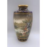 KINKOZAN; a fine Japanese Meiji period Satsuma vase painted with twin opposing panels, the first
