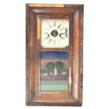 E N WELCH OF FORESTVILLE, CONN. USA; a late 19th century American mahogany veneered ogee wall clock,